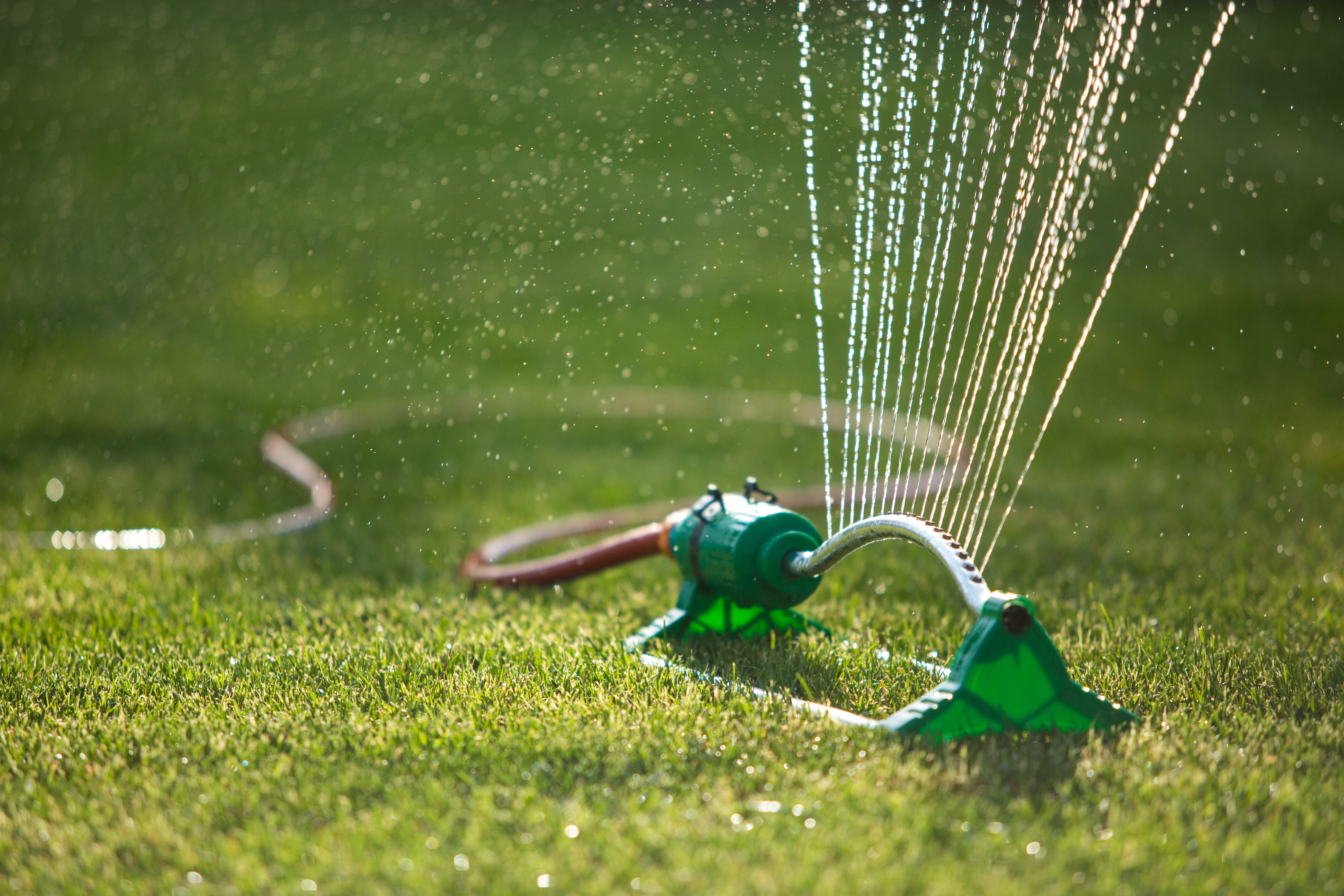 Aerating lawn deals with sprinkler system